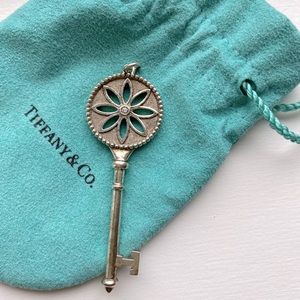 Tiffany & Co Key collection. Daisy style with one brillant cut diamond